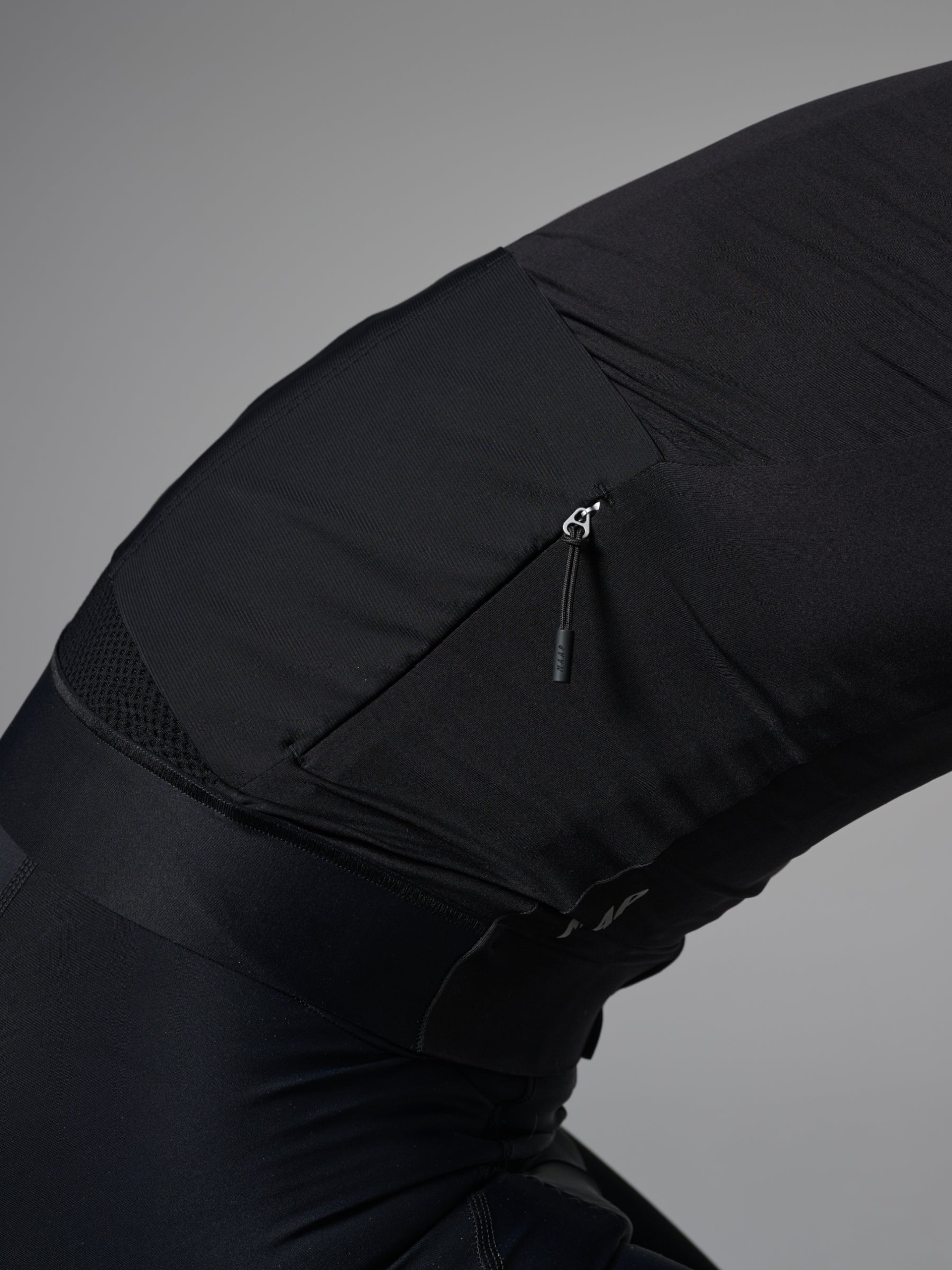 Pro Emerge LS Jersey in Crater: Additional storage with a sleek and secure low-profile internal rear zip pocket.