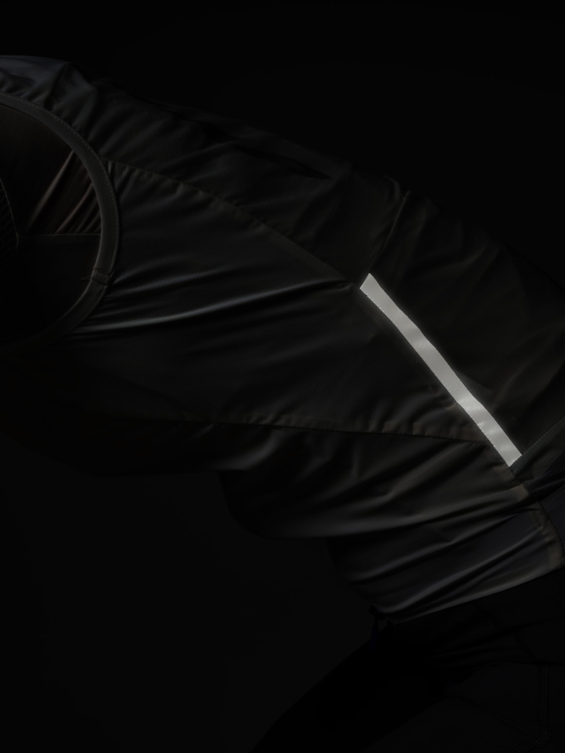 Team Flow+ Vest in Green Slate: Extra visibility in low light conditions with reflectuive tabs, trims and panels.