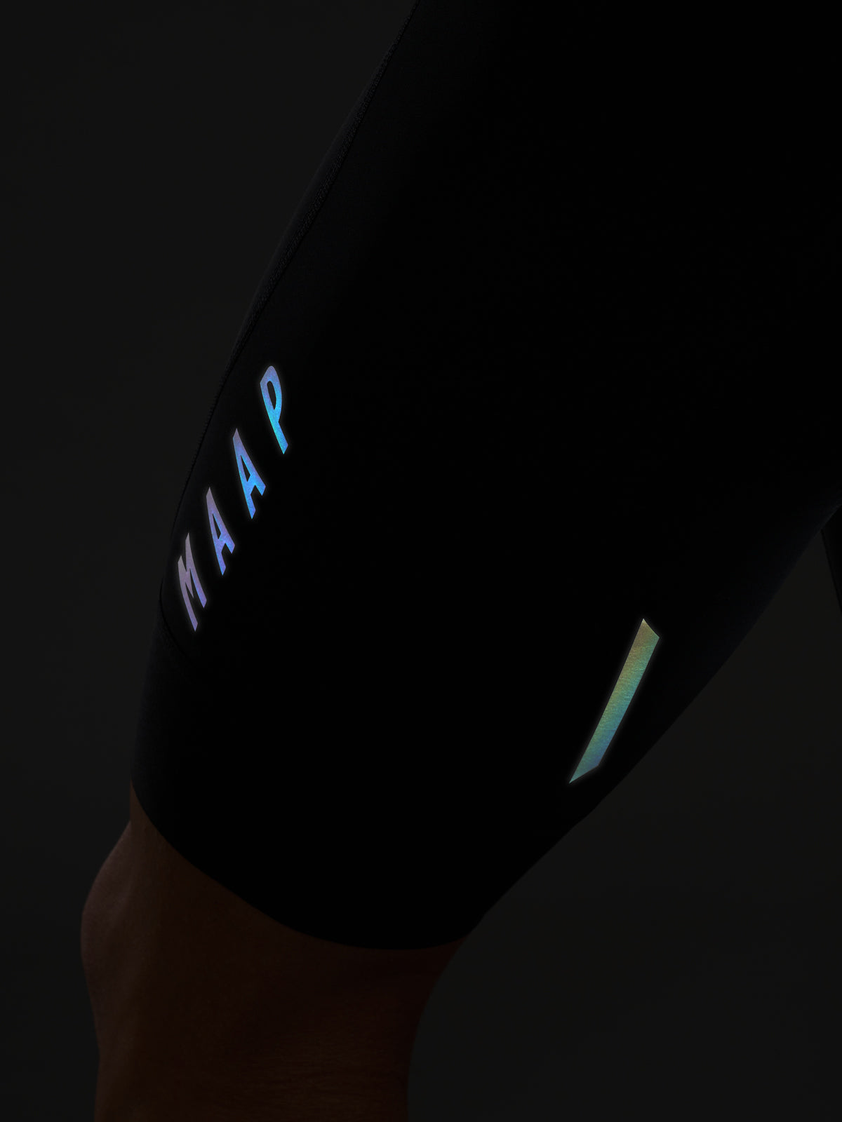 Team Bib Evo in Warm Iron: Reflective print transfers and tabs for extra visibility in low light conditions.