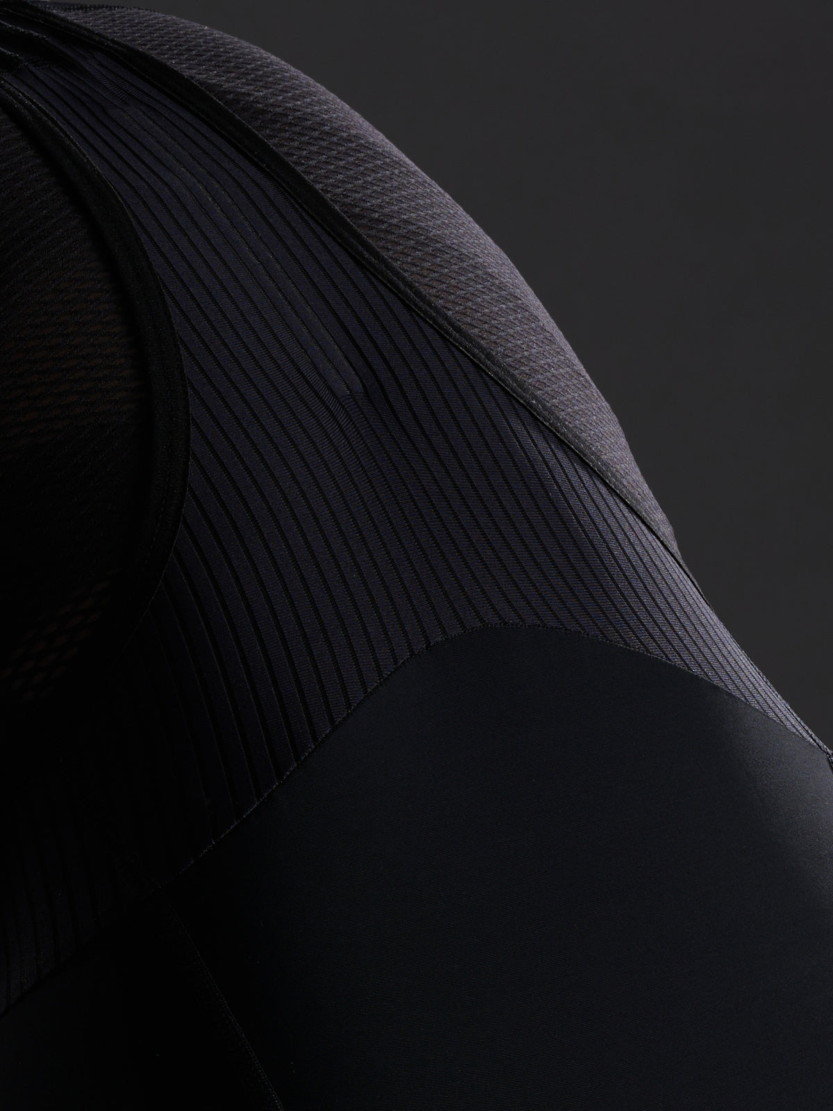 Women's Team Bib Evo in Warm Iron: Long-lasting wear with optimal stretch, recovery and shape retention throughout the main b
