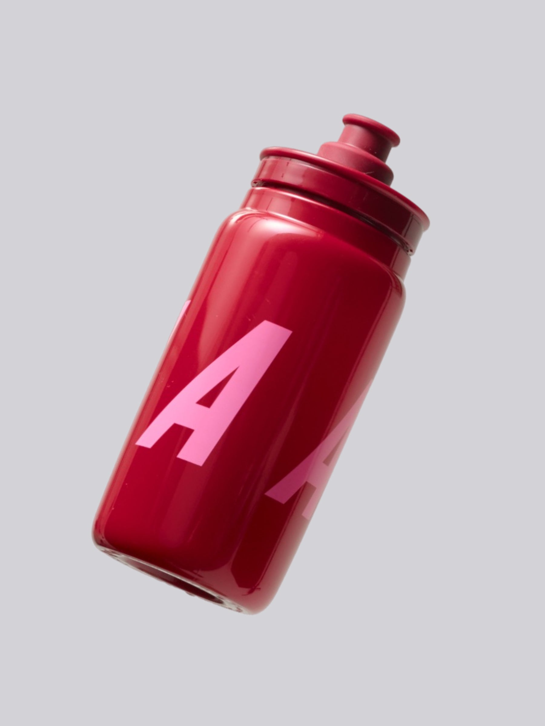 MAAP Bottle in Amaranth: Compact design for easy extraction when riding and stability in all cages.