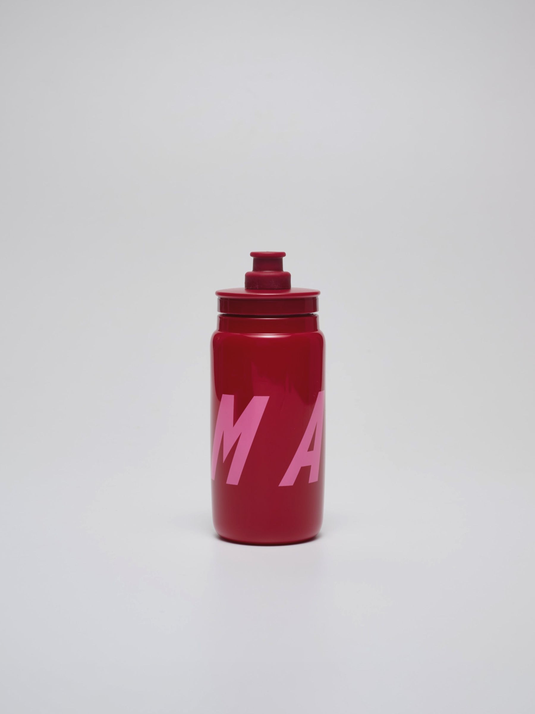 MAAP Bottle in Amaranth: Made from easy-to-squeeze LDPE material.