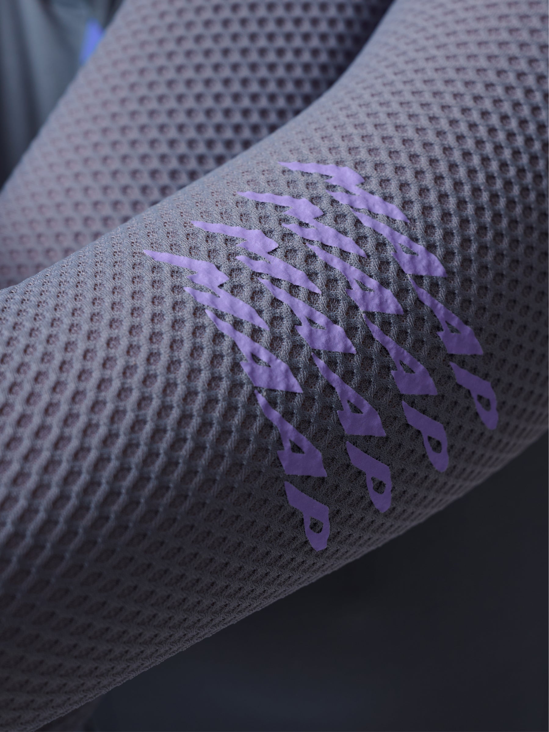 Women's Pro Emerge LS Jersey in Crater: Advanced breathability achieved through premium recycled honeycomb mesh sleeves.