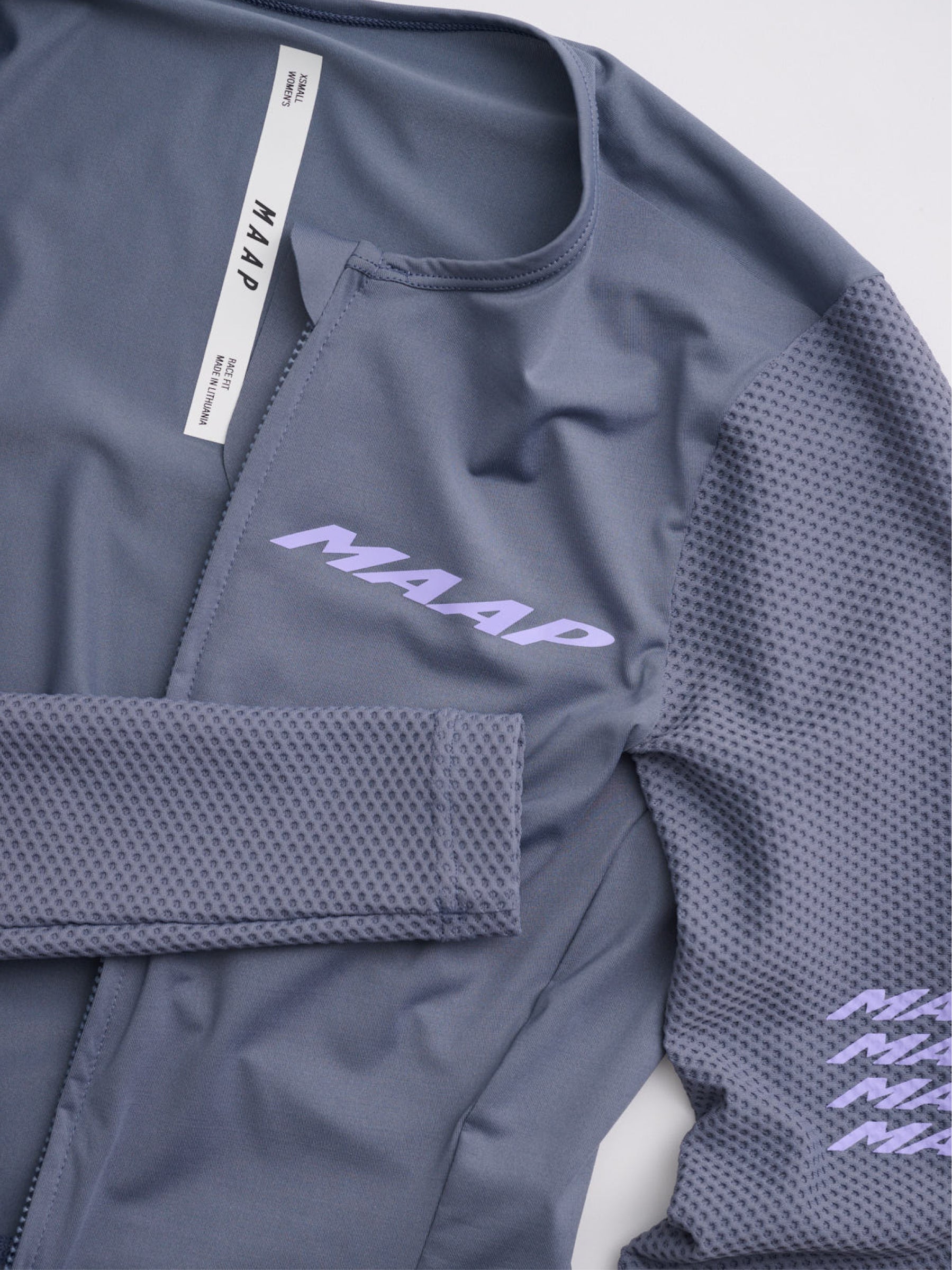 Women's Pro Emerge LS Jersey in Crater: Bonded finishes creating streamlined look.